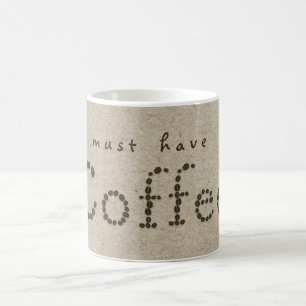 KAFFEE-Bohnen-Typografie natürliche Kraftpapier-Mu Tasse