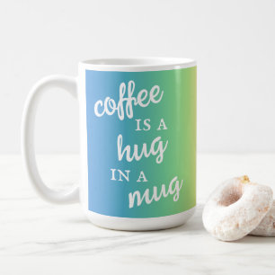 Kaffee ist ein Umarmer in einer Tasse-Regenbogen-T Kaffeetasse