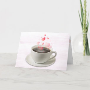 Kaffee mit Valentinherzen auf rosa Feiertagskarte