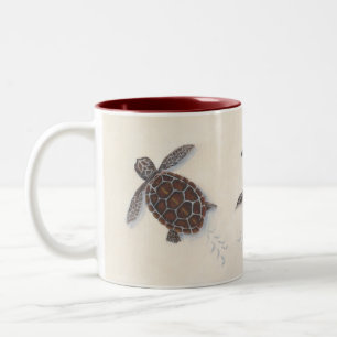 Kaffee-Tasse mit Babyseeschildkröten Zweifarbige Tasse
