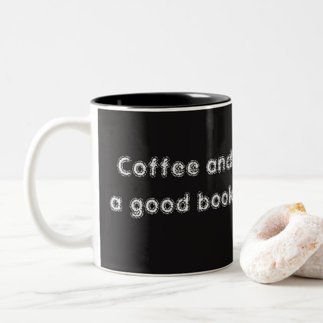Kaffee und eine gute Tasse für das Buchangebot (Mit Donut)