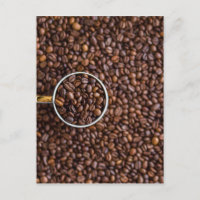 Kaffeebohnen mit Kaffee-Cup voller Bohnen