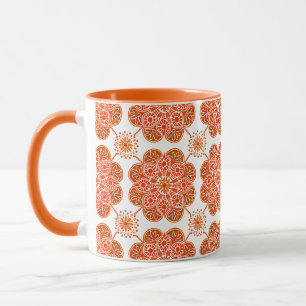 Kaffeemaschine mit rotem und orangefarbenem Tasse