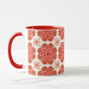 Kaffeemaschine mit roter und brauner Tasse