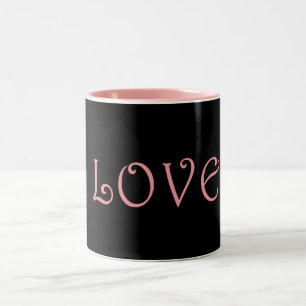Kaffeemaschine mit schwarzer und rosa Liebe Tasse
