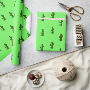 Kaktus-Pflanze auf hellgrün Geschenkpapier