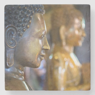 Kambodscha, Phnom Penh. Buddha-Statuen Steinuntersetzer