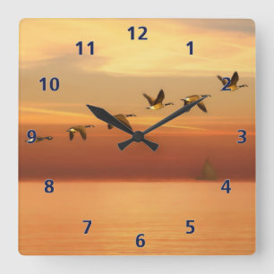 Kanada-Gänse im Flug am Sonnenuntergang Quadratische Wanduhr