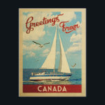 Kanada Postcard Sailboat Vintage Travel Postkarte<br><div class="desc">Dieses Greetings From Canada Vintage Reise nautical design verfügt über ein Boot auf dem Wasser mit Möwen und einen blauen Himmel gefüllt mit herrlichen puffigen weißen Wolken.</div>