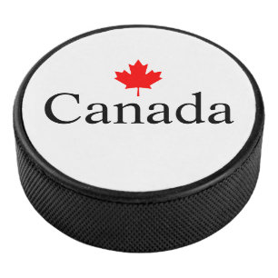 Kanadas Sondertext mit dem minimalistischen Rotapf Eishockey Puck