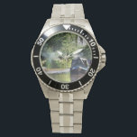KANAL ARMBANDUHR<br><div class="desc">Die im Vereinigten Königreich als Schmalboote bekannten Kanalboote wurden ursprünglich zur Beförderung von Gütern im ganzen Land eingesetzt. Sie werden heute hauptsächlich zur Freizeitgestaltung genutzt und ziehen Menschen aus aller Welt an, um unsere ländliche Umgebung zu genießen. Diese Boote sehen sehr hübsch mit ihren hellen Kabinen aus, die traditionell blau,...</div>