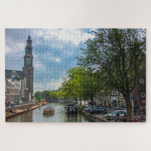 Kanal und alte Kirche in Amsterdam, Niederlande Puzzle