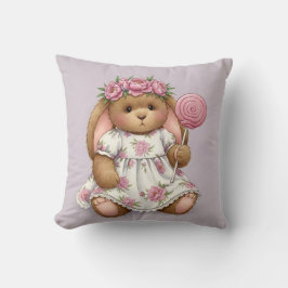 Kaninchen in einem weißen Kleid mit rosa Lollipop Kissen