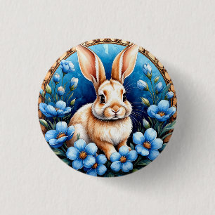 Kaninchen umgeben von blauen Blumen Button