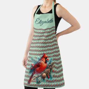 Kardinal auf der Kiefernabzweigung mit den Winterb Schürze