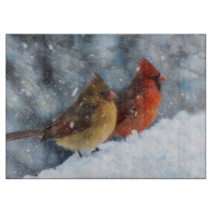 Kardinalvogel-Paar in Schnee-Kunstglas Schneidebrett