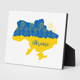 Karte der Ukraine mit Sonnenblumen und ukrainische Fotoplatte