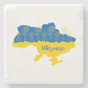 Karte der Ukraine mit Sonnenblumen und ukrainische Steinuntersetzer