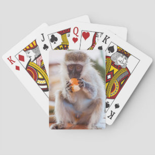Kartenspielen mit dem Vorderbild des Affenessens Spielkarten