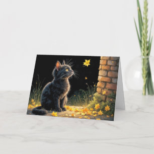 Kätzchen sieht ein fallendes Herbstblatt Karte