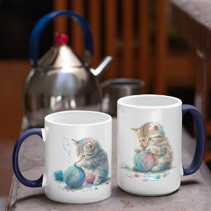 Kätzchen spielen mit einem Ball aus Garn Kaffeetasse