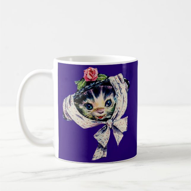 Kätzchenkatze in einem Kätzchen Kaffeetasse (Links)