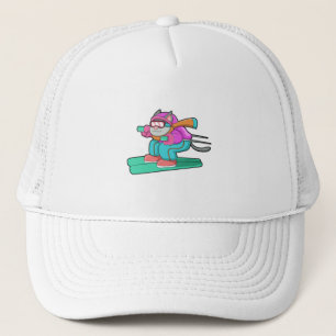 Katze als Skijumper mit Ski & Skibrille Truckerkappe