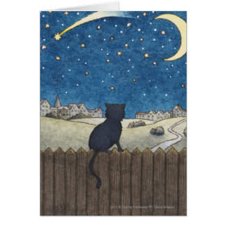 Katze auf einem Zaun, der nächtlichen Himmel über