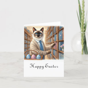 Katze Bibliothekar mit Ostereierkorb in der Biblio Feiertagskarte