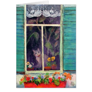 Katze im Fenster mit Blume-Box