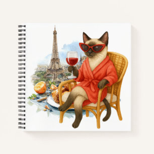 Katze im Ruhestand trinkt Wein in Paris Frankreich Notizbuch