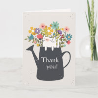 Katze in der a-Bewässerungs-Dosen-Karte (Foto