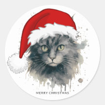 Katze in einer Weihnachtsmannmütze frohe Weihnacht