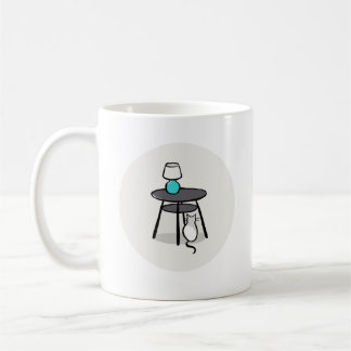 Katze unter Tasse