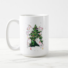 Katzen klettern und schmücken einen Weihnachtsbaum Kaffeetasse