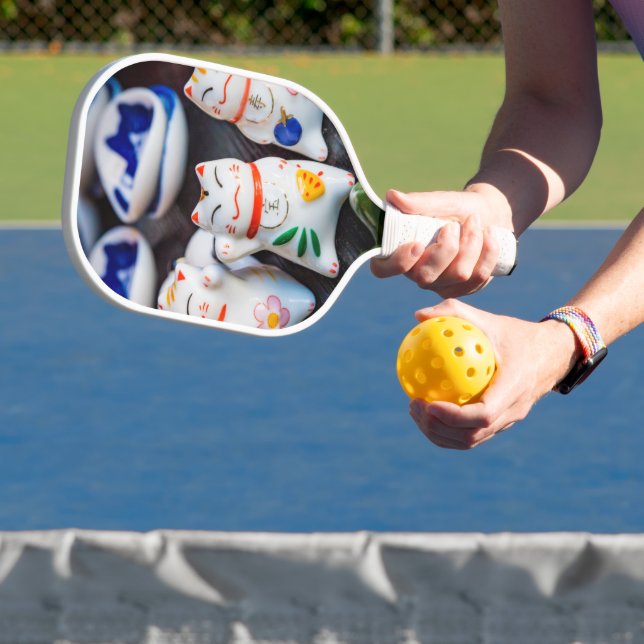 Katzenfiguren werden pickleball schläger (InSitu)