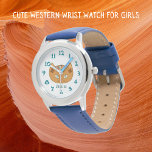 Katzenkatze und Aquamariner Western Armbanduhr<br><div class="desc">Diese niedliche Armbanduhr für Western ist für Kinder gedacht. Das Design wurde von den alten Indianern Rio Grande inspiriert. Die Erdfarben sind ocker, braun, türkis und rot. Diese aquamarinen Augen blicken aus einem leicht lesbaren Uhrengesicht heraus. Es gibt aquamarine Zahlen und einen Namen in der passenden aquamarin können Sie personalisieren....</div>