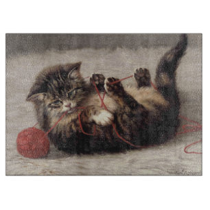 Katzenklatsche, eine Katze, die Galle aus dem Garn Schneidebrett