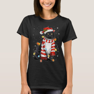 Kawaii Niedliche schwarze Katze Santa hat sich im T-Shirt