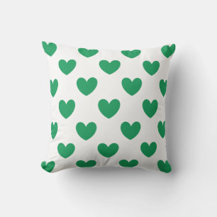 Kelly green polka herzen auf weiß kissen