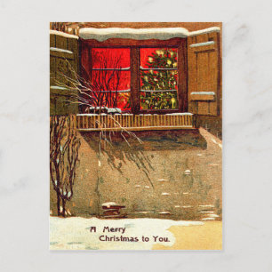 Kerzenbeleuchteter Weihnachtsbaum im Fenster eines Feiertagspostkarte