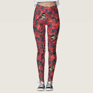 Kichervögel auf Blaubeeren-Ästen auf Orange Leggings