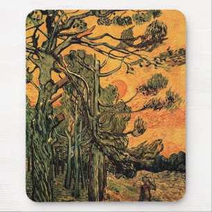 Kiefern gegen einen roten Himmel mit untergehender Mousepad