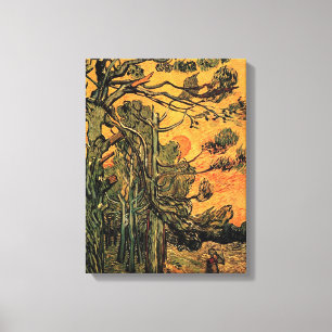 Kiefernbäume gegen einen roten Himmel und Sonnenun Leinwanddruck