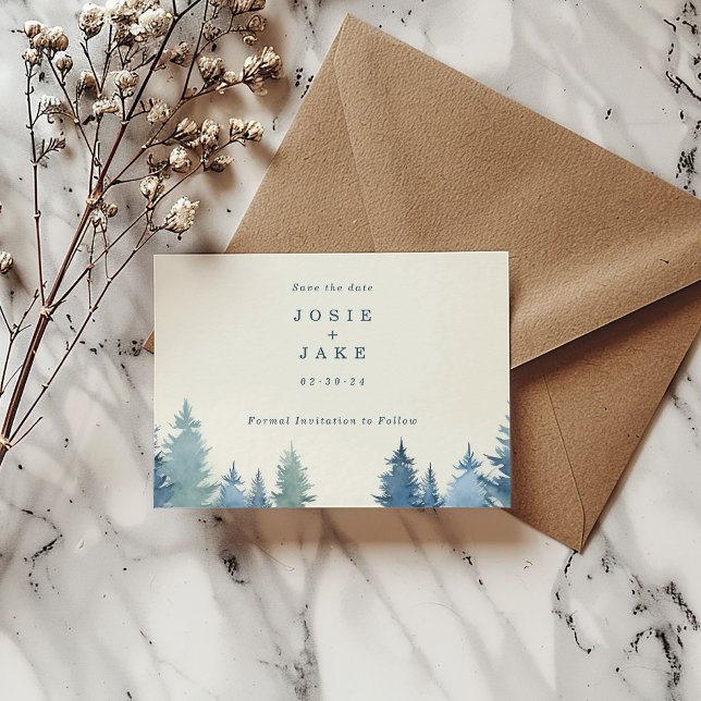 Kiefernbäume Save the Date (Soft pine trees save the date card with bride and groom name and date next to a brown envelope.)