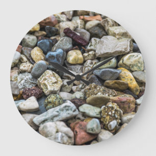 Kiesel auf einer Strand-Wanduhr Große Wanduhr