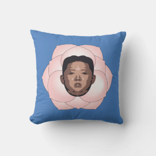 Kim Jong Un auf einer Magnolia auf einem blauen Fe Kissen