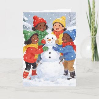 Kinder bauen einen Schneemann Feiertagskarte