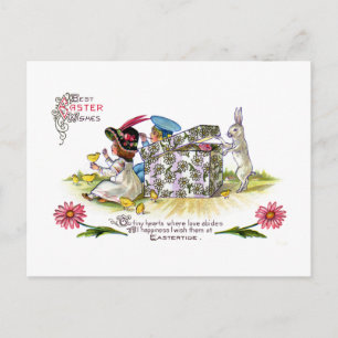 Kinder, Küken und Vintages Ostern der Kaninchen Feiertagspostkarte