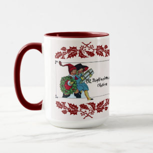KINDER MIT CHRISTMAS GIFTS UND ROTEN FLORALEN TASSE